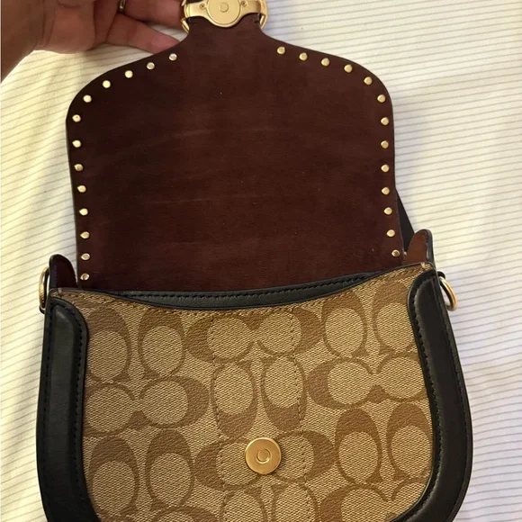 COACH Georgie Saddle Crossbody Bag colorblock signature canvas with rivets.